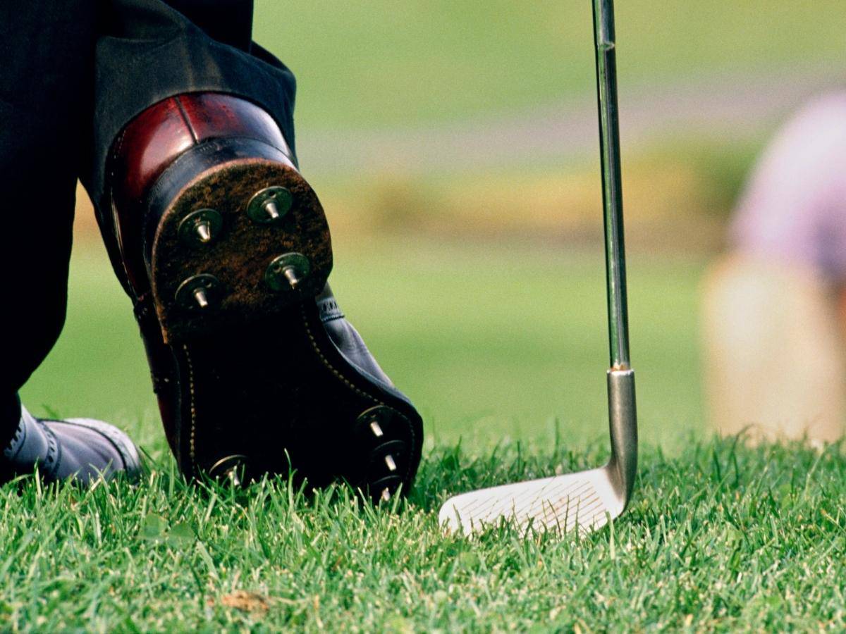 Golfer Wearing Spikes